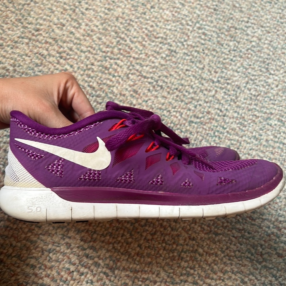 Purple Nike sneakers